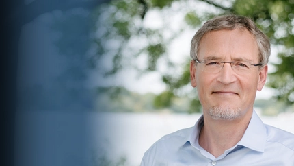 The "Real" Tragedy of the Commons: Can a Dual Currency System Achieve a Pareto-superior Equilibrium? Cover